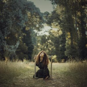 Adventurous guide portrait in mystical circular frame