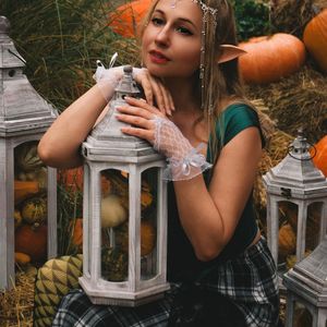 Magical team member portrait in vine-decorated frame