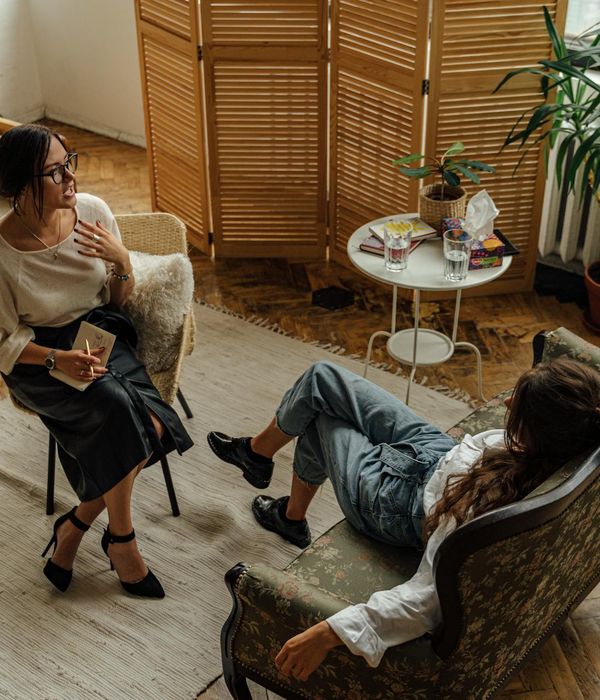 Professional travel consultation session with detailed maps